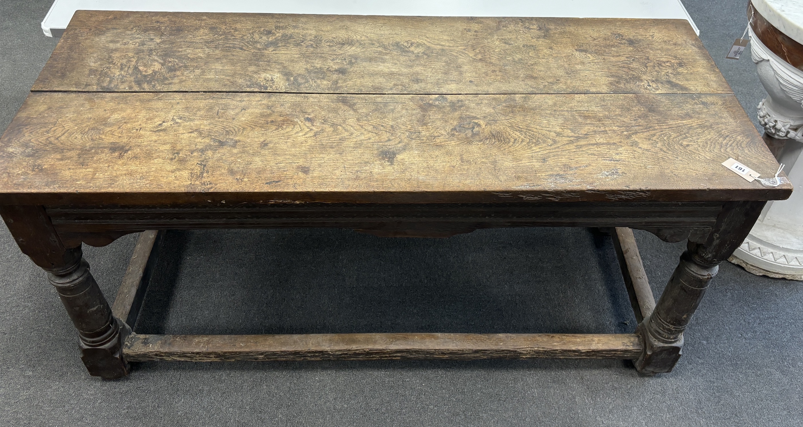 A 17th century style rectangular oak refectory table width 163cm, depth 66cm, height 77cm.